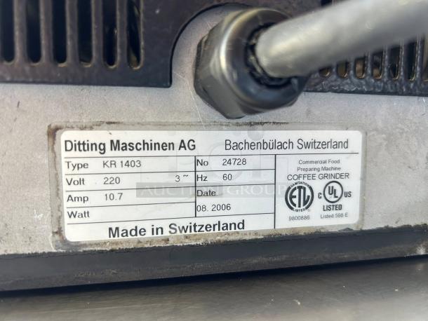 Ditting KR1403 coffee grinder label, made in Switzerland, 220V, 10.7A, model number 24728, dated August 2006, excellent condition.