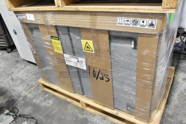Brand new Hoshizaki EUF48A stainless steel undercounter freezer, 2 doors, 115V, boxed with caution labels and markings.