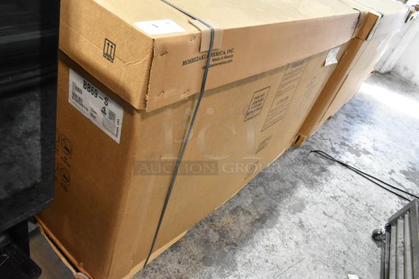 Brand new Hoshizaki BB69-S stainless steel commercial back bar cooler in box, 115 volts, 1 phase, visible packaging labels.