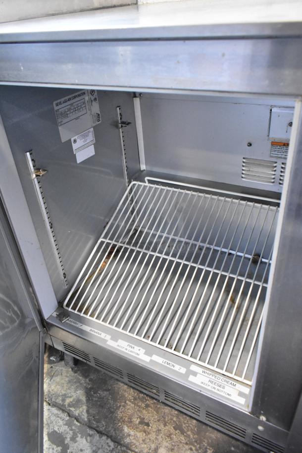 Beverage Air UCR48A stainless steel undercounter cooler, 2 doors, commercial casters, labels visible, 115V, 1 Phase.