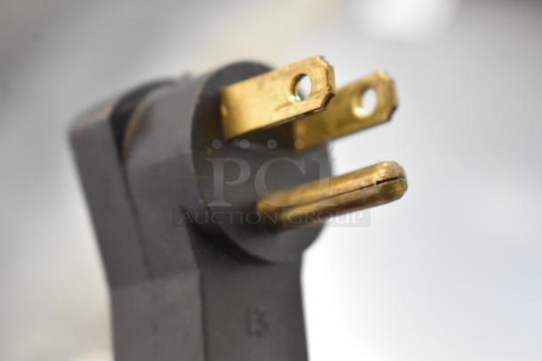 Close-up of a power plug compatible with the Beverage Air UCR48A stainless steel commercial undercounter cooler.