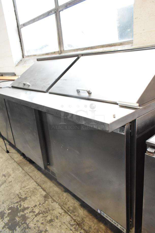 Beverage Air SPE60-24M stainless steel prep table on casters; dual lid, commercial use, 115V, in good condition.
