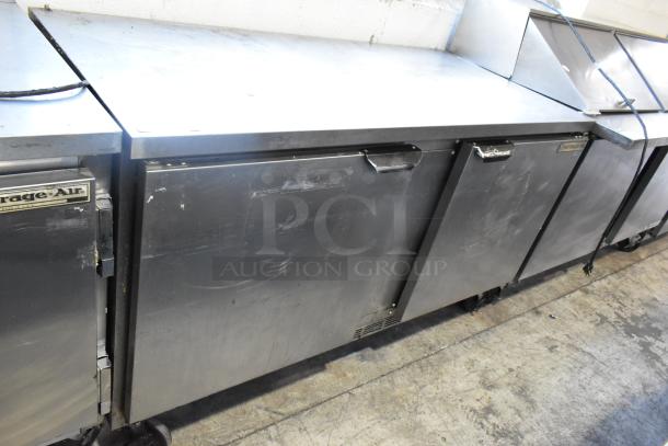 Beverage Air stainless steel 2-door undercounter cooler, used, on casters. 115 volts, 1 phase. Slight surface wear visible.