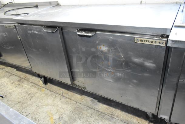 Beverage Air stainless steel 2-door undercounter cooler on casters, 115V, 1 phase, showing signs of wear.