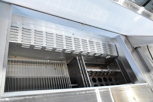 2019 Continental SW48-18M stainless steel sandwich prep table featuring two drawers and one door. Interior view shows storage compartments.