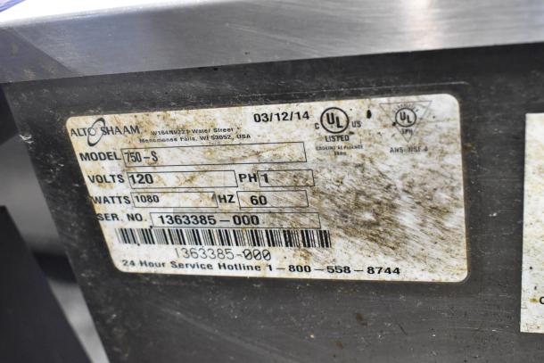 Alto Shaam 750-S heated holding cabinet label showing model, volts 120, phase 1, watts 1080, and serial number.