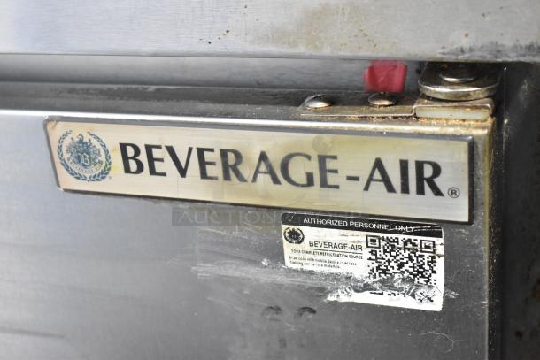 Beverage Air stainless steel worktop cooler, single door, on casters, 115V, 1-phase, shows brand label and QR code.