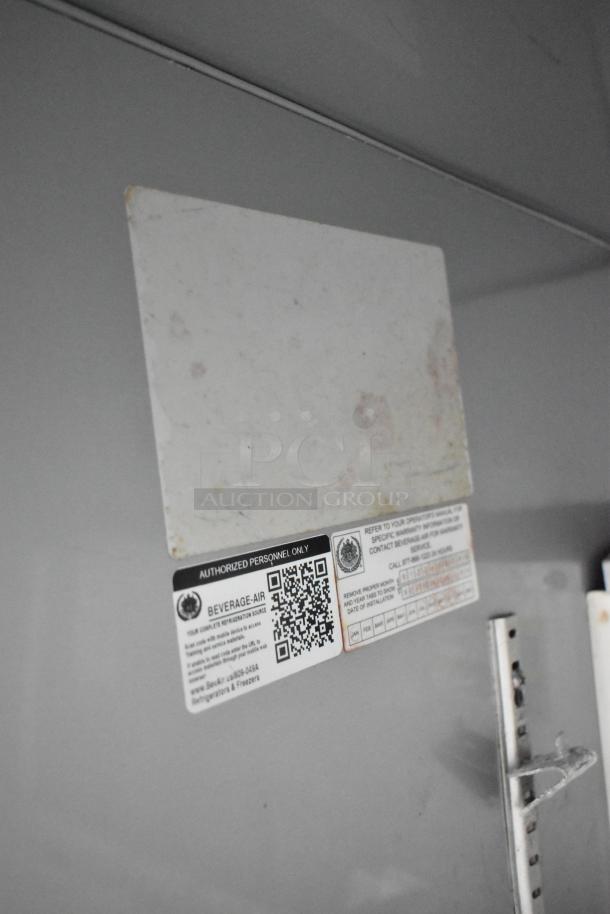 Beverage Air stainless steel commercial single door work top cooler, 115 volts, 1 phase, labels indicating authorized use.