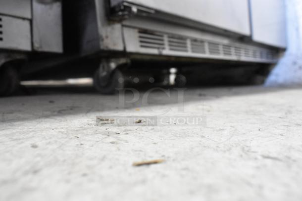 Beverage Air UCR48A stainless steel 2-door undercounter cooler on casters, showing commercial-grade construction.