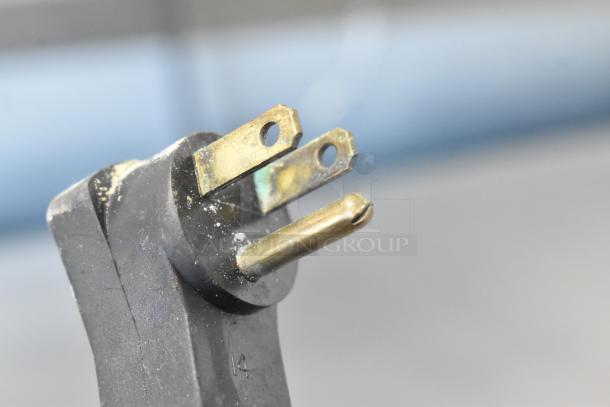 This image focuses on the plug of a Beverage Air UCR48A undercounter cooler, showcasing its 115-volt, 1-phase power compatibility.