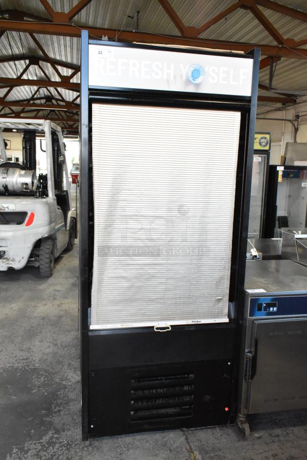 Structural Concepts Oasis B32EW metal reach-in merchandiser, 120V, 1 phase, featuring a roll-up door.