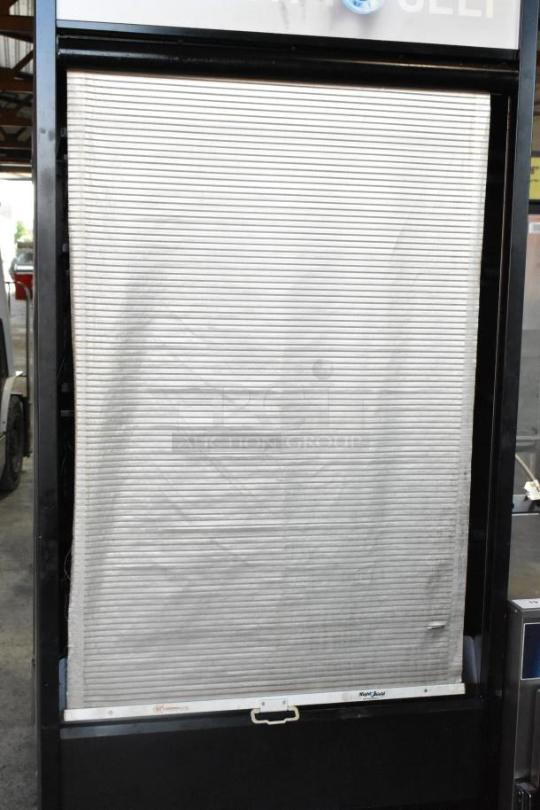 Structural Concepts Oasis B32EW metal commercial reach-in merchandiser, 120V, 1 phase, with protective covering.