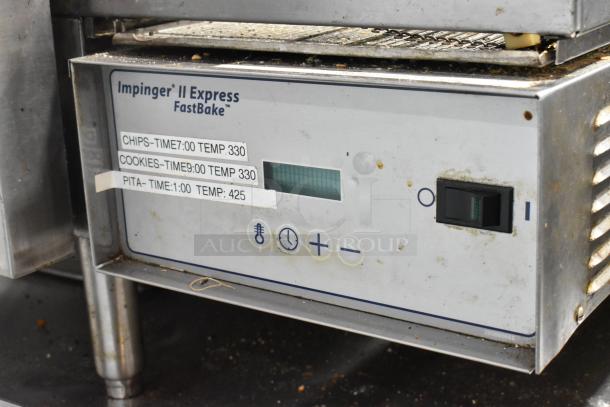 Lincoln Impinger 1132-000-D-KF017 stainless steel electric conveyor pizza oven, 208V, 3-phase, model settings visible.