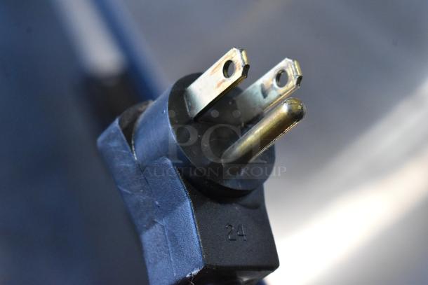 Three-prong plug of Beverage Air UCR48A commercial cooler, emphasizing its compatibility with standard outlets.