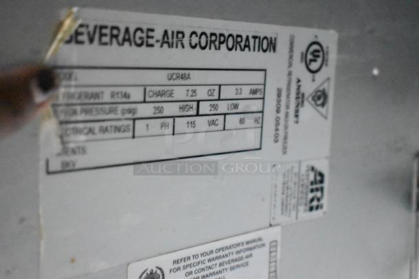 Beverage Air UCR48A stainless steel undercounter cooler label showing model, specs, and electrical ratings.