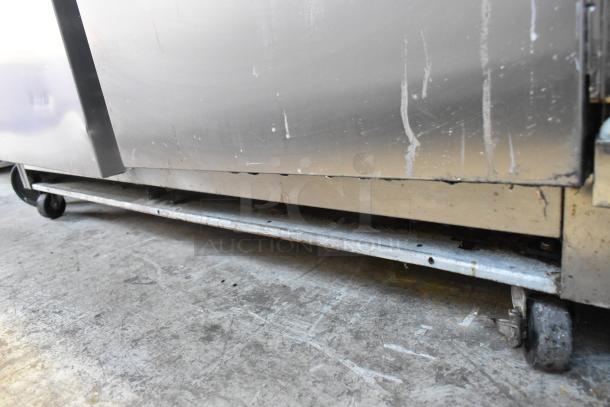 Beverage Air UCR48A stainless steel commercial 2-door undercounter cooler on casters, 115V, 1 phase, showing wear.