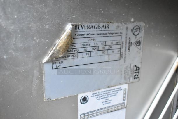 Beverage Air UCR48A stainless steel 2-door undercounter cooler, 115V, 1 phase, on commercial casters, label details shown.
