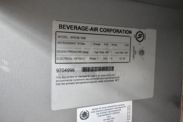 Beverage Air SPE48-18M stainless steel prep table label showing model, refrigerant R134a, and electrical ratings of 115V, 1 Phase.