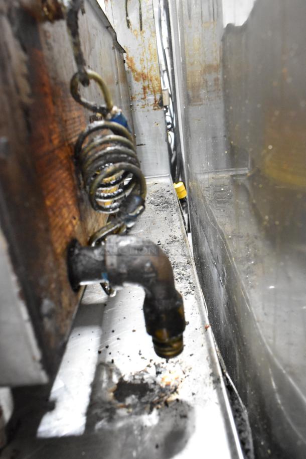 Vulcan MSA36-101 stainless steel griddle, 81,000 BTU, natural gas, showing worn and rusted back view with gas connection.