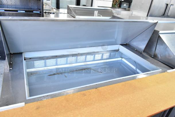 Beverage Air SPE48-18M stainless steel prep table, bain marie compartment open, on commercial casters, 115V, 1 phase.