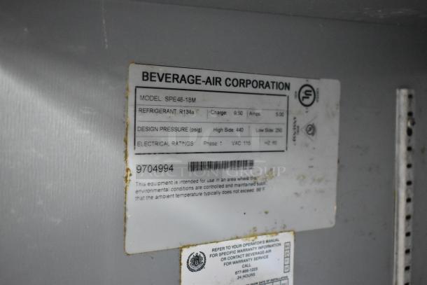 Beverage Air SPE48-18M stainless steel commercial sandwich prep table label showing model, voltage, and refrigerant details.