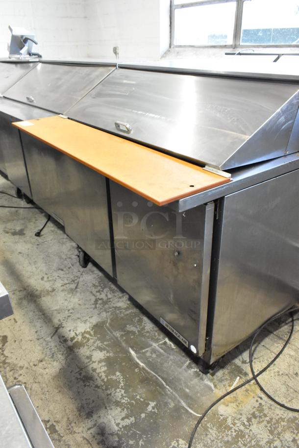 Beverage Air SPE48-18M stainless steel sandwich salad prep table on casters, 115 volts, 1 phase, good condition.