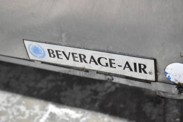 Beverage Air SPE48-18M stainless steel prep table, identifiable logo, on commercial casters. 115 volts, 1 phase.
