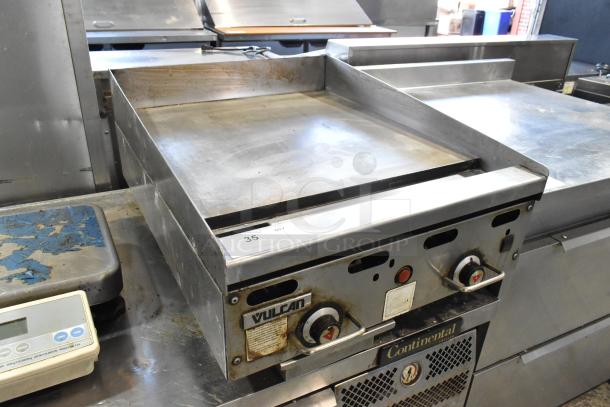 Vulcan MSA24-101 stainless steel commercial flat top griddle, natural gas powered, 54,000 BTU, used condition, visible controls.
