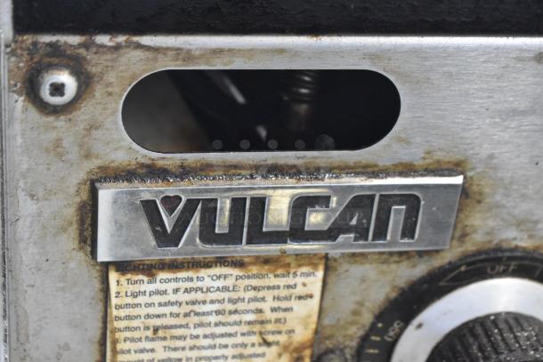 Vulcan MSA24-101 stainless steel griddle, natural gas, 54,000 BTU. Features visible logo and lighting instructions. Condition shows signs of use.