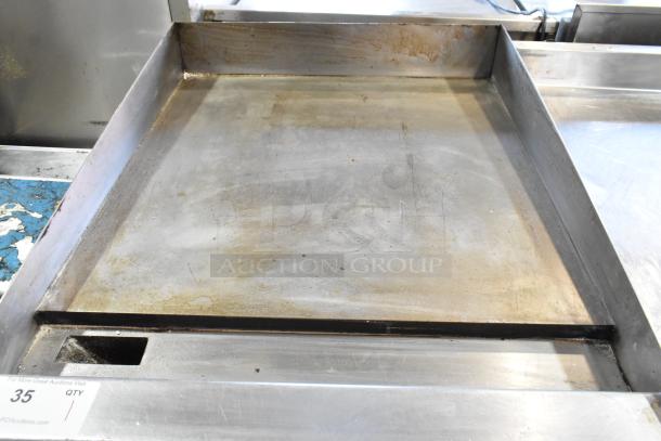 Vulcan MSA24-101 stainless steel countertop griddle, natural gas, 54,000 BTU, visible signs of use, auction tag number 35.