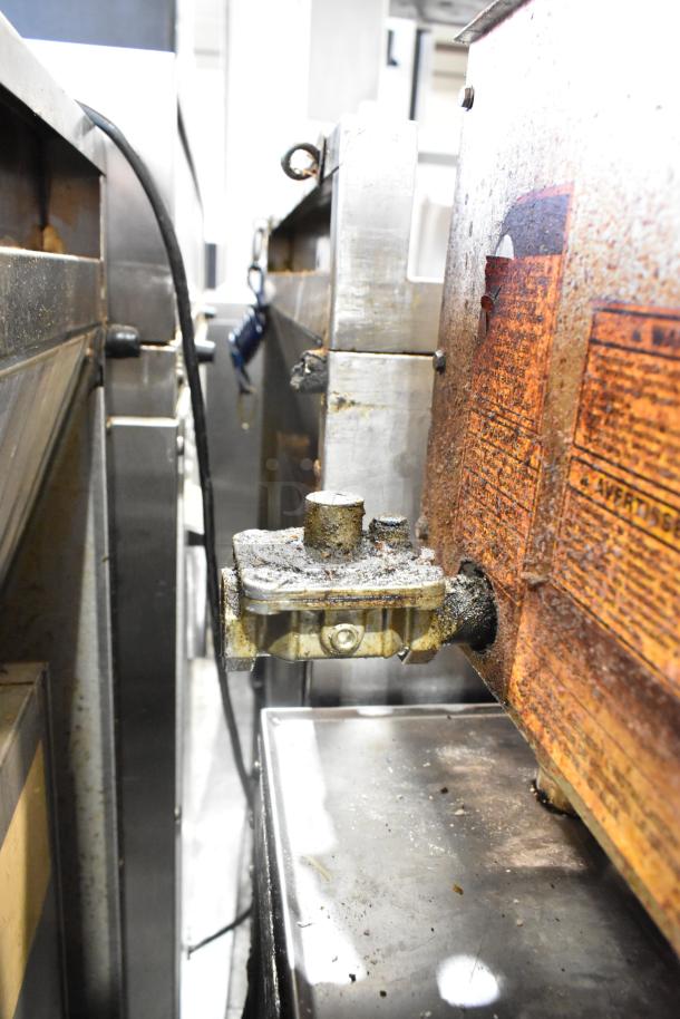 Vulcan MSA24-101 stainless steel griddle, natural gas, 54,000 BTU, showing surface wear and gas fittings.