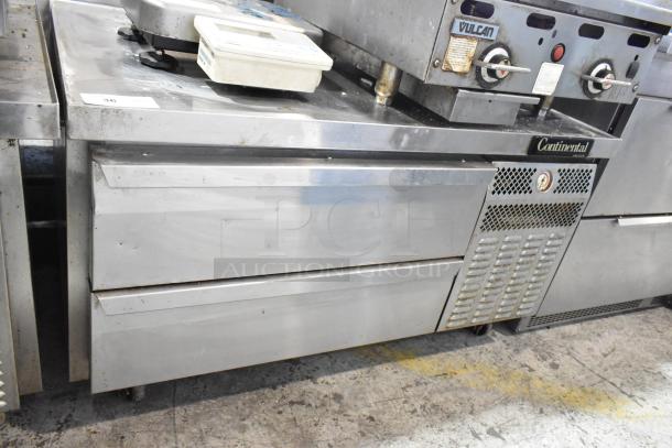 2018 Continental stainless steel 2-drawer chef base freezer on casters, 115V, commercial use, visible wear.