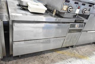 2018 Continental stainless steel 2-drawer chef base freezer on casters, 115V, commercial use, visible wear.