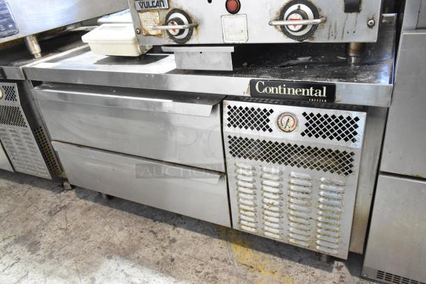 2018 Continental stainless steel 2-drawer chef base freezer, commercial casters, 115V, 1 phase, fair condition.