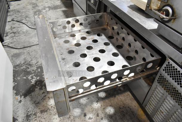 2018 Continental stainless steel 2-drawer chef base freezer, commercial casters, 115 volts, 1 phase, perforated drawer design.