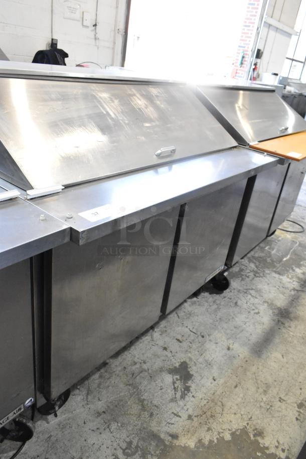 Beverage Air SPE48-18M stainless steel prep table with lid, on casters. 115V, 1 phase. Suitable for commercial use.