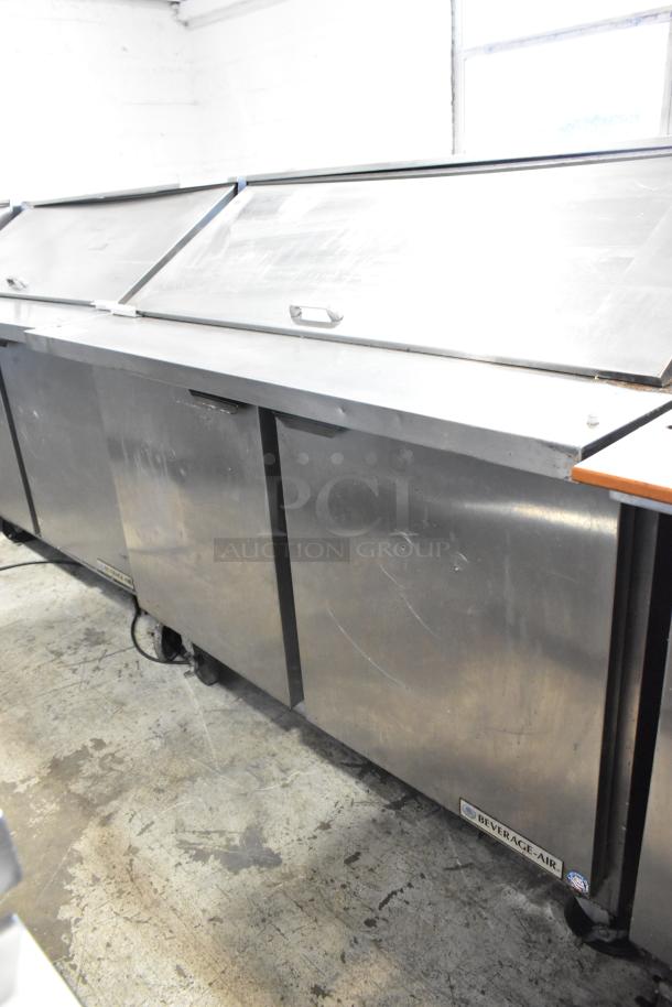 Beverage Air SPE48-18M stainless steel sandwich salad prep table, commercial casters, 115V, 1 phase, visible wear.