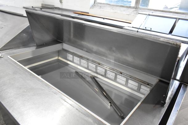 Beverage Air SPE48-18M stainless steel prep table, bain marie style, on casters. Features 18-pan top, 115V, 1 phase.