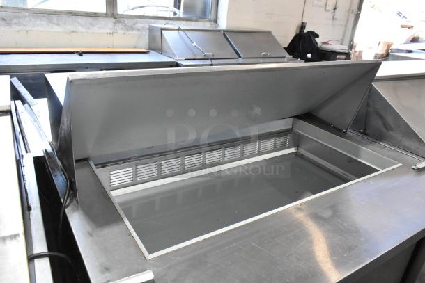 Beverage Air SPE48-18M stainless steel sandwich prep table with Bain Marie, commercial casters, 115V, 1 phase.
