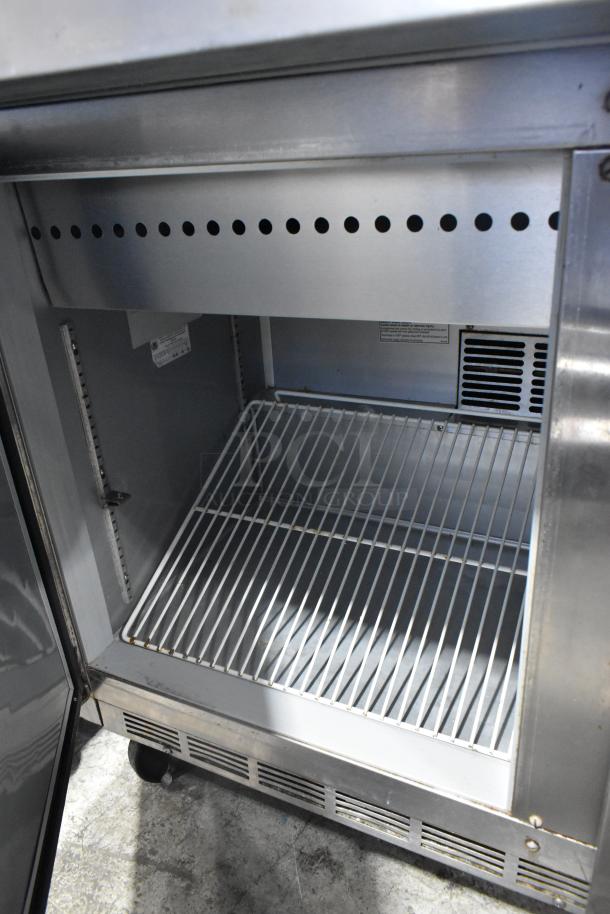 Stainless steel Beverage Air SPE48-18M sandwich salad prep table with bain marie, on casters, 115V, 1 phase.