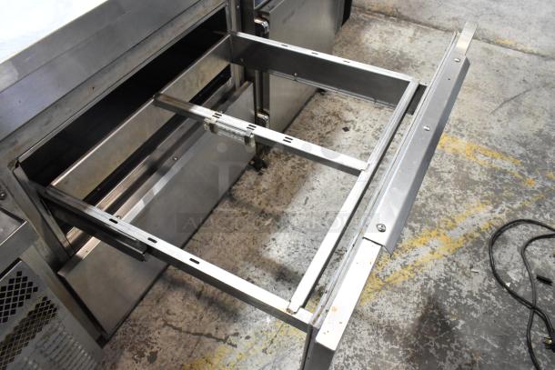 Randell stainless steel 2-drawer work top cooler, commercial grade, 115 volts, 1 phase. Open drawer view showing interior frame.