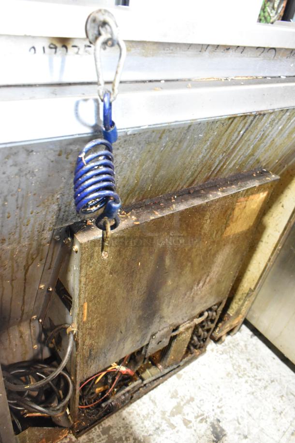 Randell stainless steel commercial 2-drawer worktop cooler, 115 volts, 1 phase. Visible wear and wiring exposed.