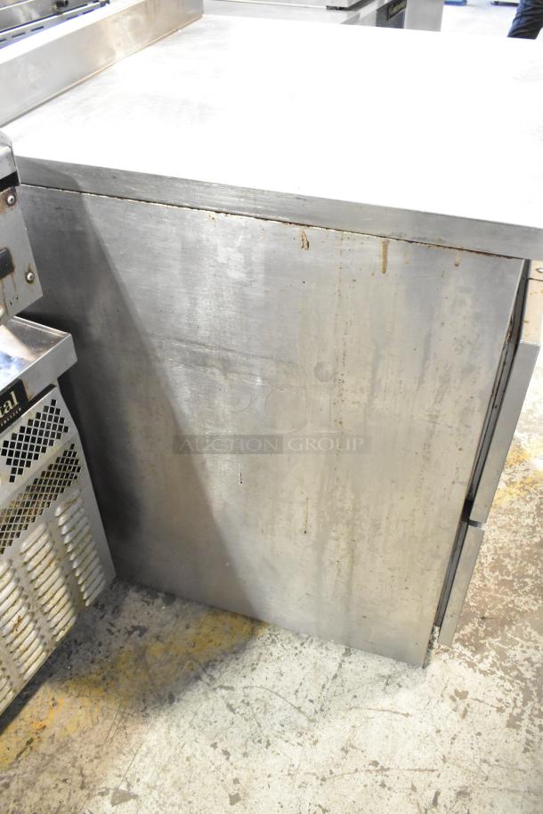 Randell stainless steel 2-drawer work top cooler, 115 volts, 1 phase, showing some surface wear.