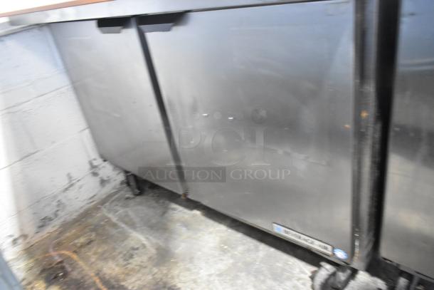 Beverage Air SPE48-18M stainless steel sandwich prep table with bain marie, on casters. 115V, 1 Phase. Used, good condition.