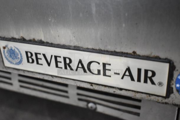 Beverage Air SPE48-18M stainless steel prep table, visible brand plate, used condition, commercial casters, 115V, 1 phase.