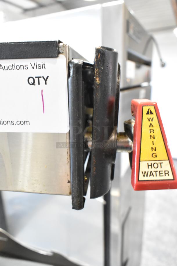 Bunn ITCB-DV Stainless Steel Iced Tea Machine with hot water dispenser, 120V, worn condition. "Warning Hot Water" label visible.