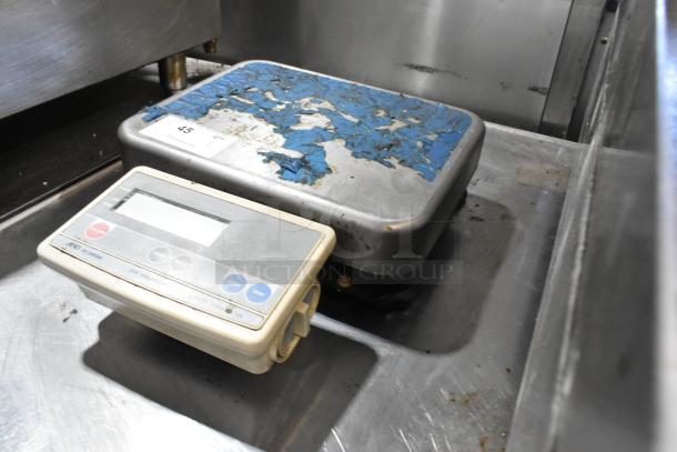 AND FG-30KBM food scale, 60 lb capacity. Worn surface; visible control panel; used condition. Model details intact.