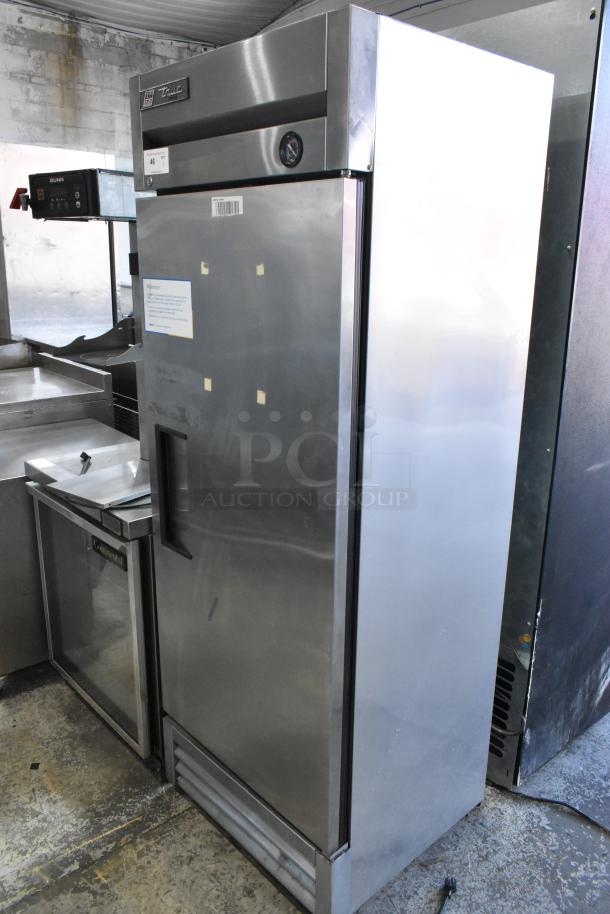 2017 True T-19F stainless steel reach-in freezer with poly-coated racks. Single door, 115 volts, 1 phase. Commercial use.