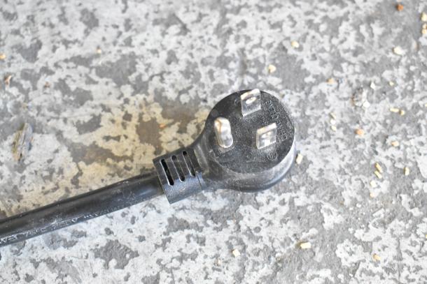 Power plug for a 2017 True T-19F commercial freezer. Black cable, grounded plug, suited for 115 volts, 1 phase.