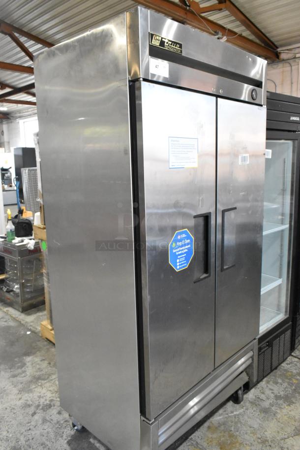 2016 True T-35 stainless steel 2-door commercial cooler with poly-coated racks, on casters. 115 volts, 1 phase.